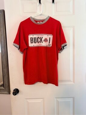 Nike Red Ringer Tee with Gray Trim and Columbus Buckeyes License Plate Graphic